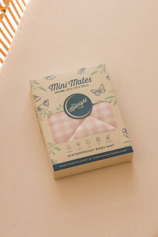 Pink and white gingham baby mat in box